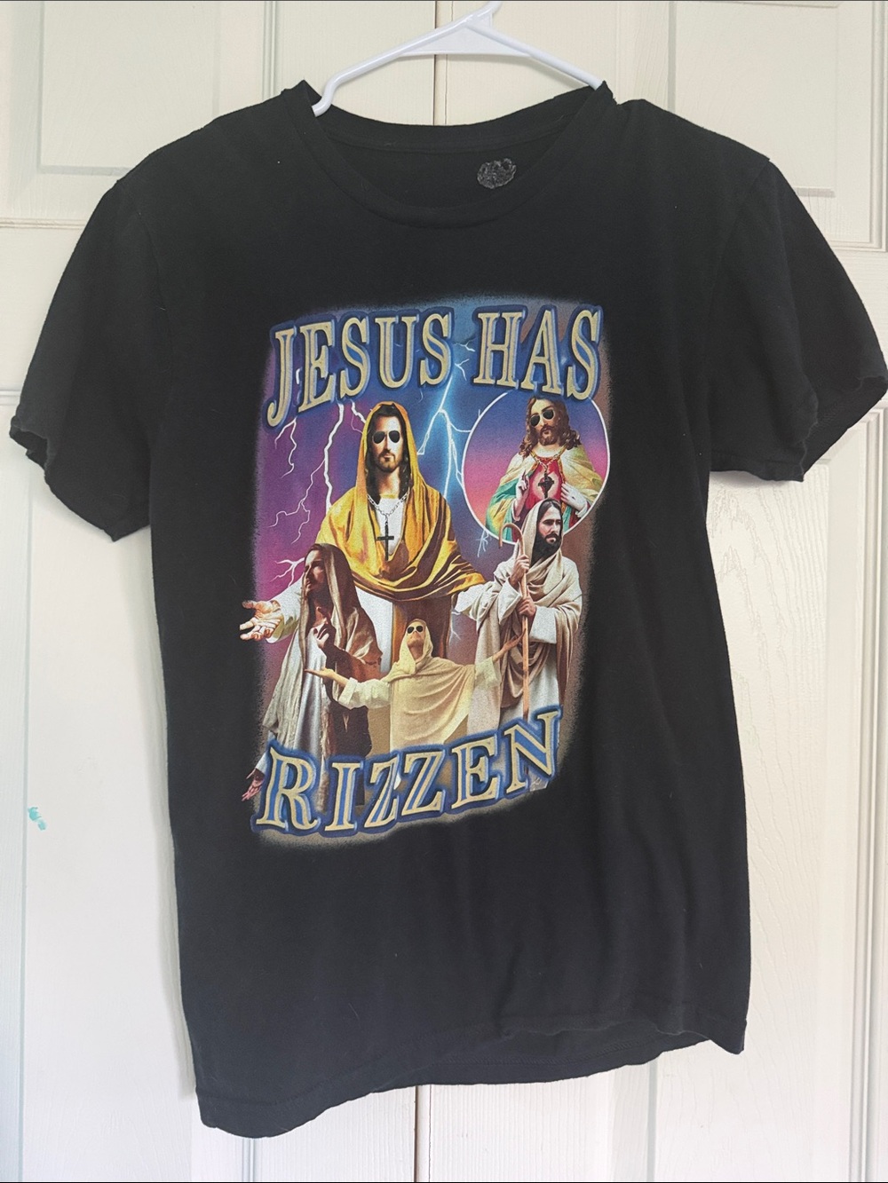Black Short Sleeve Tee with Multicolor 'Jesus Has Rizzén' Graphic